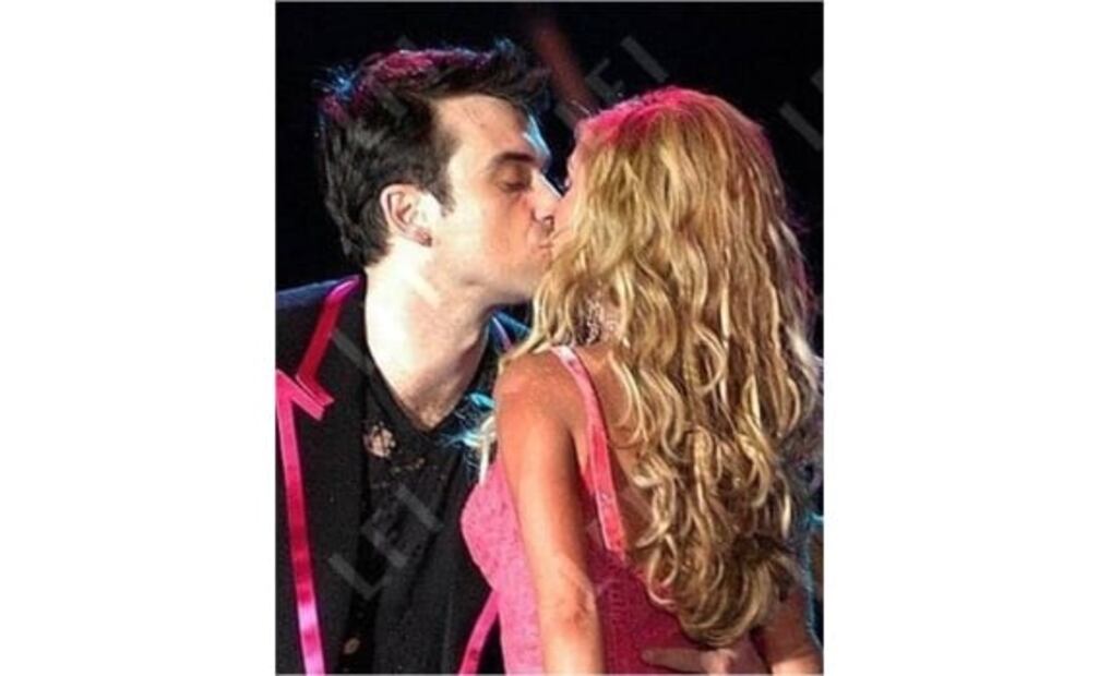 Robbie Williams, Madonna y Adrien Brody, protagonistas de los besos que han cimbrado el espectáculo