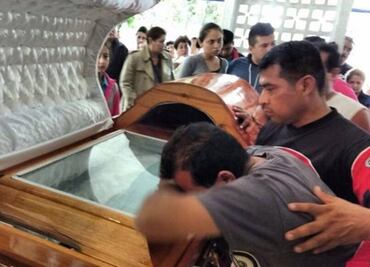 Friends and relatives bid farewell to slain journalist in Mexico