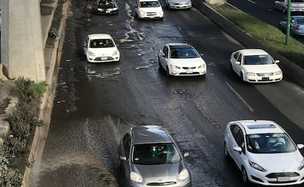 Baches y fuga de agua complican circulación en Periférico Norte