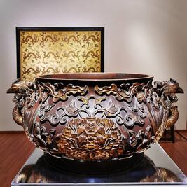 Un incensario de bronce chino para guardar pelotas de tenis