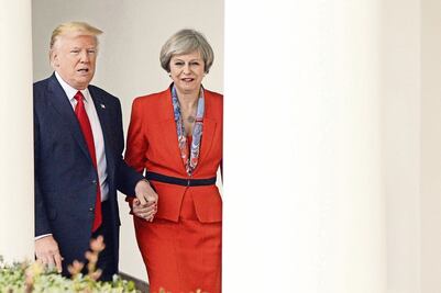 May busca pacto comercial con Trump