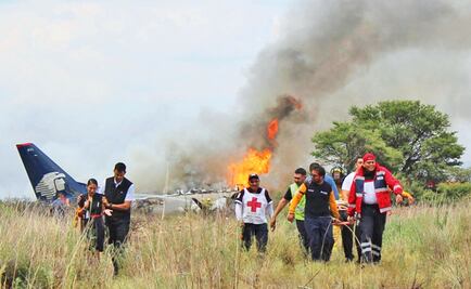 Investigators search for causes of Aeromexico plane wreckage