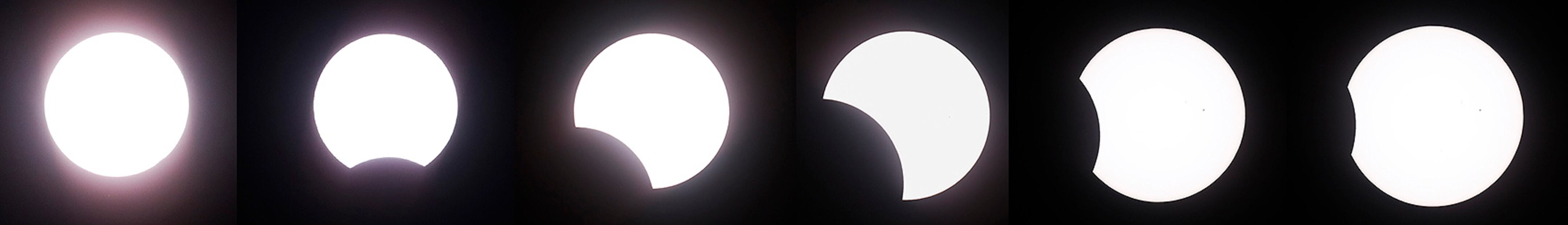 Quezon City (Philippines), 20/04/2023.- A composite photo of six images shows phases of a partial hybrid solar eclipse seen from an astronomical observatory compound in Quezon City, Metro Manila, Philippines, 20 April 2023. The hybrid solar eclipse started with an annular eclipse going to a total eclipse and returned to annular phase. (Filipinas) EFE/EPA/ROLEX DELA PENA