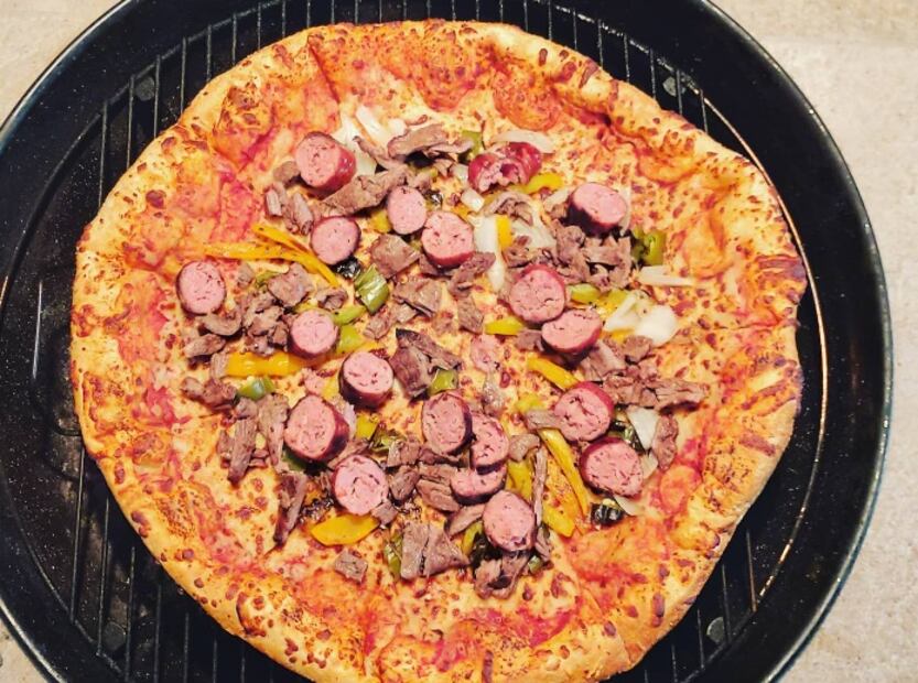 Pizza, en todo el mundo se adapta a la región y se come por igual