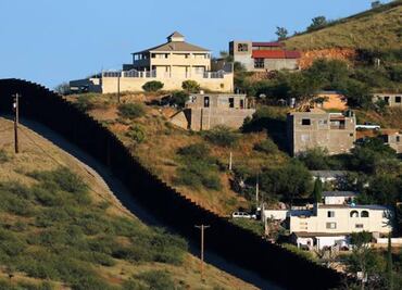 Along the U.S.- Mexico border fence