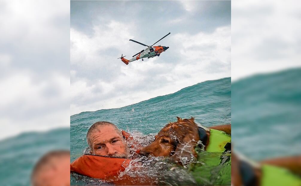 La Guardia Costera salvó a un hombre y a su perro en el mar, mientras la tormenta arremetía en Sanibel, Florida. Foto: AP