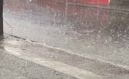 ¡Tultitlán se pinta de blanco! Intensa lluvia y granizada deja afectaciones; elementos del organismo de agua realizan desazolve