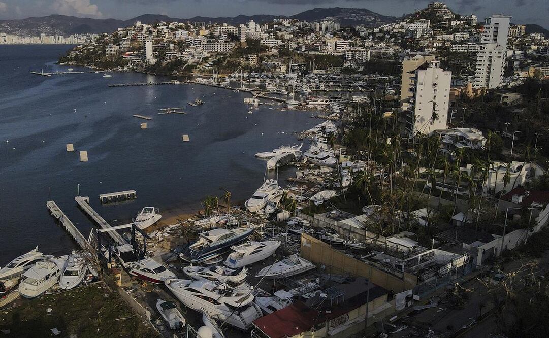 Como era costumbre, los hombres de mar se quedaron a cuidar sus embarcaciones ante el ciclón, del que nunca imaginaron sus efectos catastróficos. Foto: AP