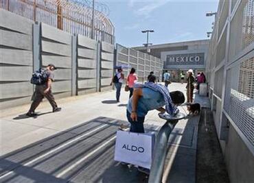 At the San Ysidro crossing, pedestrians need passports to enter Mexico