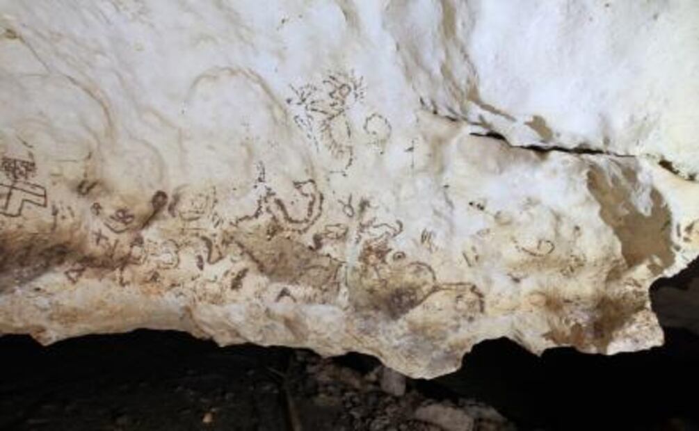 Hallan en la selva maya una cueva con pinturas rupestres