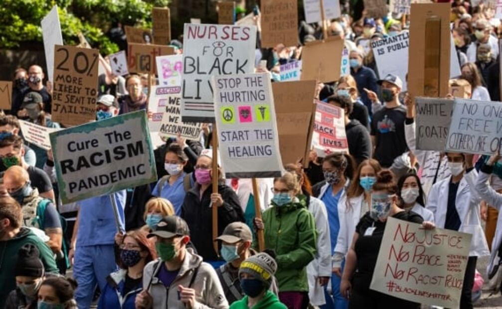 Miles marchan hacia la Casa Blanca para protestar contra el racismo en EU