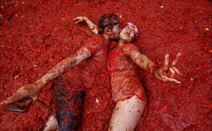 FOTOS: Miles de personas participan en la popular fiesta de la Tomatina en España