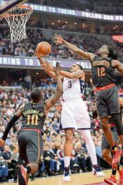Wizards sofoca aleteo de los Hawks
