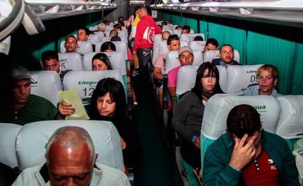 First of 8,000 stranded Cuban migrants cross into U.S.