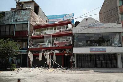 Denuncian rapiña en edificio colapsado en la Roma