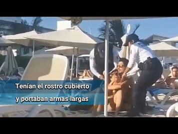 Detienen y esposan a turistas en playa concesionada de Riviera Maya