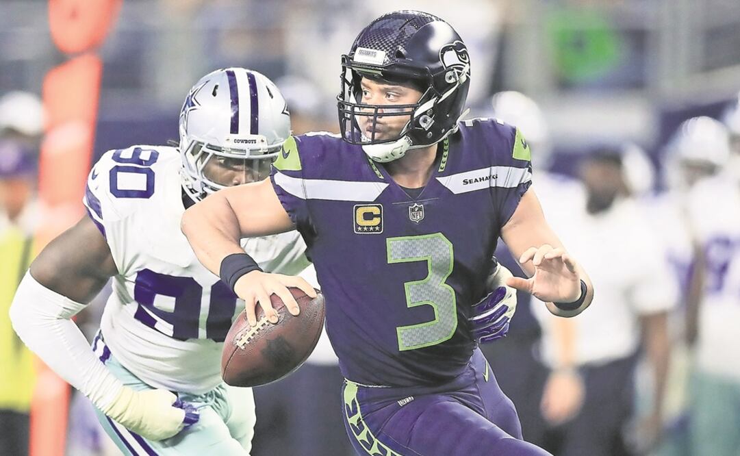 Russell Wilson, de Seahawks, con escasa posibilidad. (RONALD MARTINEZ. AFP )