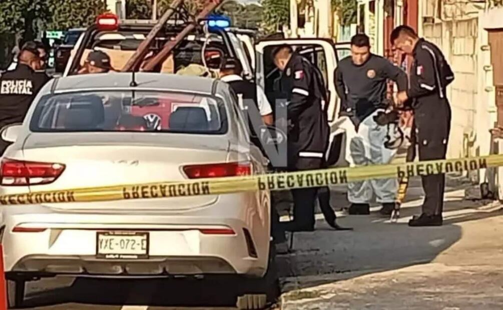 Elementos de seguridad acuden al lugar donde fue localizado el cuerpo de un hombre al interior de un pozo en Mérida (06/05/2025). Foto: Especial