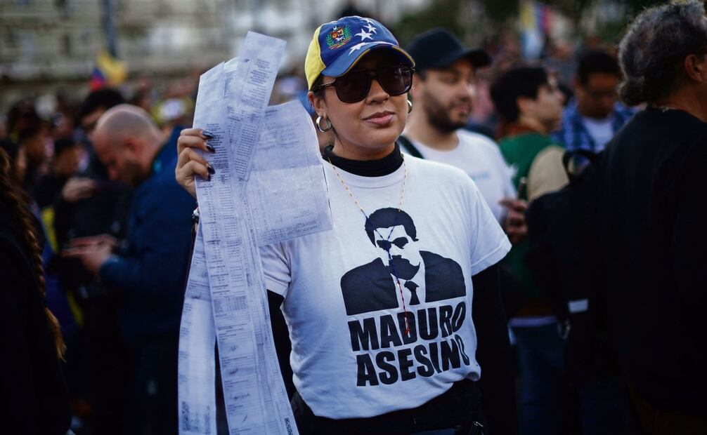 Manifestantes durante la protesta
del domingo en Caracas Foto: Tomás Cuesta AFP