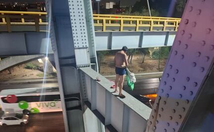 Hombre escala puente vehicular en inmediaciones del AICM; amenazaba con arrojarse al vacío