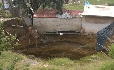 Sismo agrava socavón; amenaza a dos casas