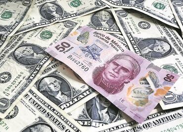 Dólar cierra arriba de 21 unidades por primera vez desde mediados de junio