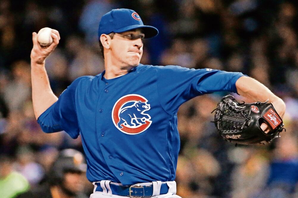 Kyle Hendricks es el encargado de frenar a los Dodgers para celebrar como campeones de la Liga Nacional. (FOTO: GENE J. PUSKAR. AP)