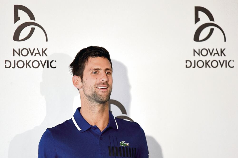 Novak aceptó con cierta tristeza las recomendaciones médicas (ANDREJ ISAKOVIC. AFP)