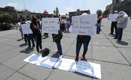 Viudas de policías emboscados en Coatepec de Harinas protestan por falta de equipo 