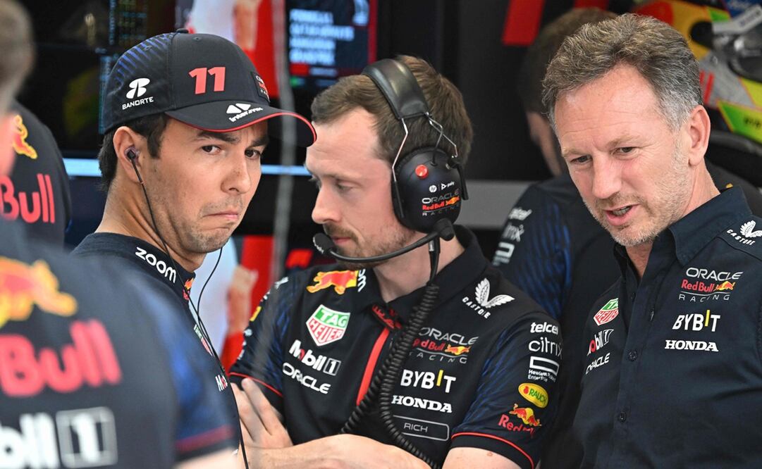 Checo Pérez y Christian Horner durante las actividades del Gran Premio de Hungría 2023 - Foto: AFP
