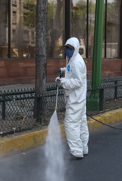COVID-19: The anonymous heroes disinfecting Mexico City streets