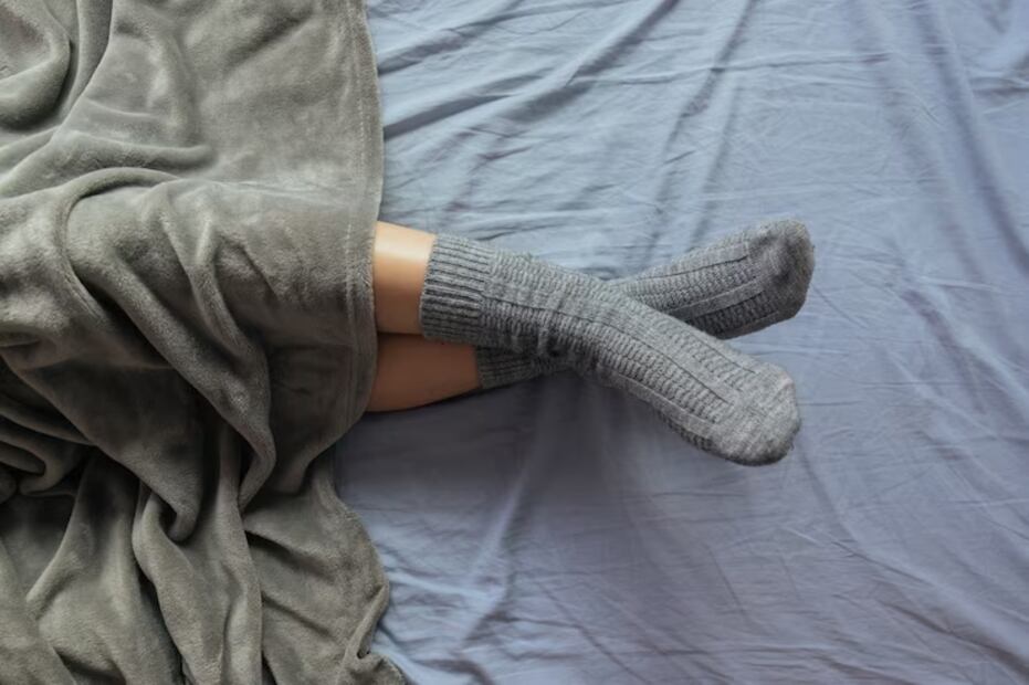 Dormir con medias. Fuente: Freepiks