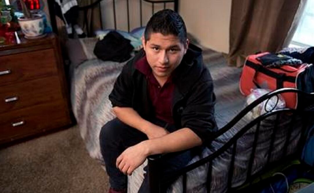 Marvín Velasco, 15, is from Guatemala. His sponsor told him he would be punished if he left the apartment, and demanded rent payments. Then he started withholding food. (Photo: AP)