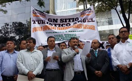 Taxistas se deslindan de agresión a Uber en AICM