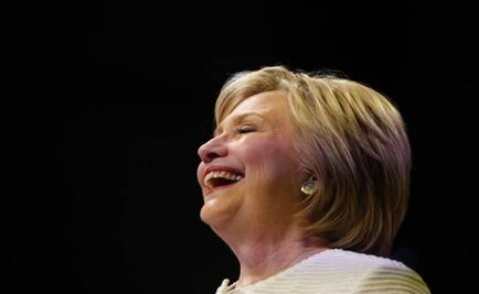 Clinton thrilled Obama 'has my back' in U.S. election