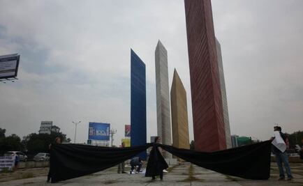 "Enlutan" las torres de Satélite