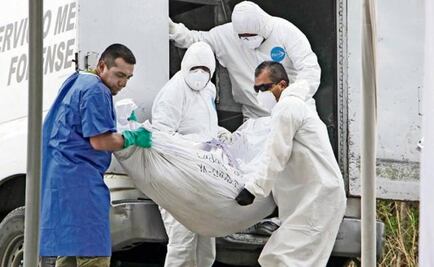 Mexican officials exhume 117 corpses from common grave