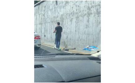 Captan a usuario de scooter Lime circular en Viaducto