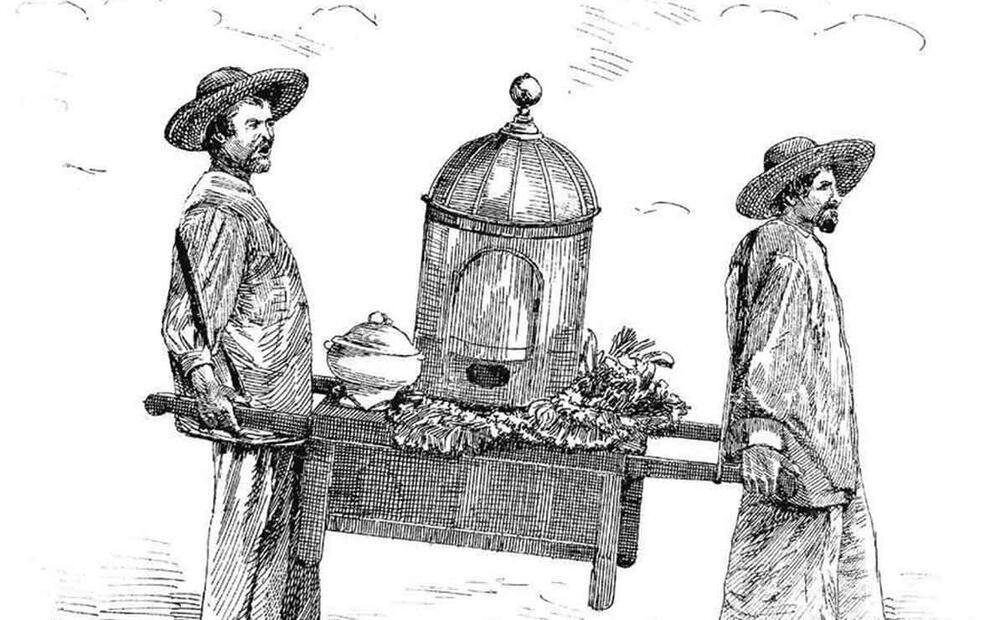 El grabado titulado "Los vendedores de cabezas" apareció en el diario "La patria ilustrada", del 28 de septiembre de 1885, y muestra a dos vendedores ambulantes que avanzan descalzos mientras cargan su horno portátil, mismo en que solía venderse la barbacoa. Foto: ESPECIAL.