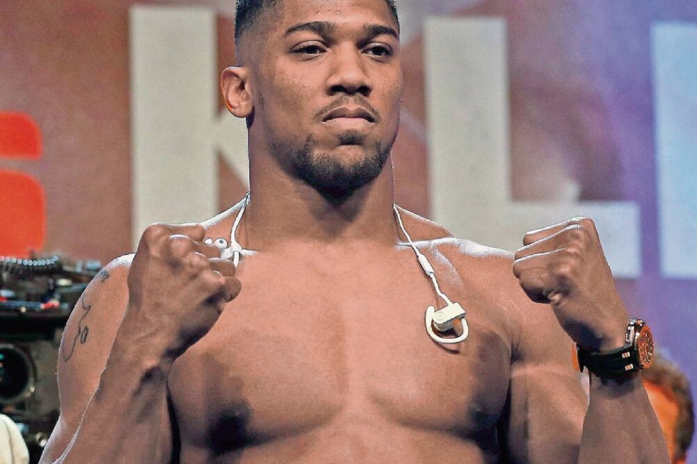 Joshua es campeón de la FIB y quiere sumar el cetro de la AMB. (ADRIAN DENNIS. AFP)