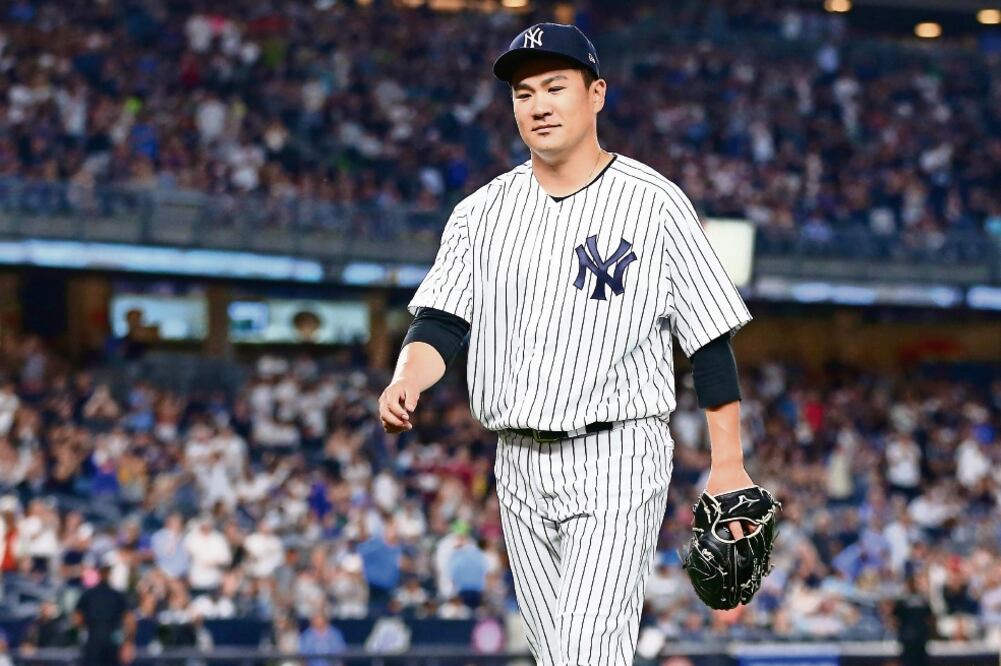 Masahiro trabajó durante ocho innings y retiró a 17 bateadores en fila. (Mike Stobe. afp)