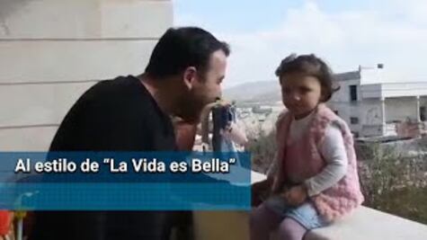 "Vamos a reír cuando caiga la bomba”; en medio de bombardeo, padre sirio enseña a su hija a reírse