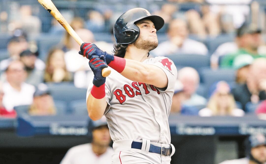 Benintendi pegó par de cuadrangulares de tres carreras. (FRANK FRANKLIN II. AP)