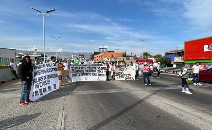 Manifestantes bloquean el Paso Exprés en Cuernavaca; exigen la aparición de comerciantes desaparecidos 