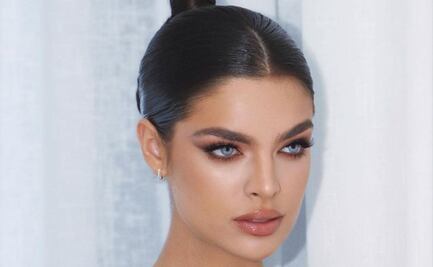 Nadia Ferreira acelera los latidos de Marc Anthony con su espalda descubierta