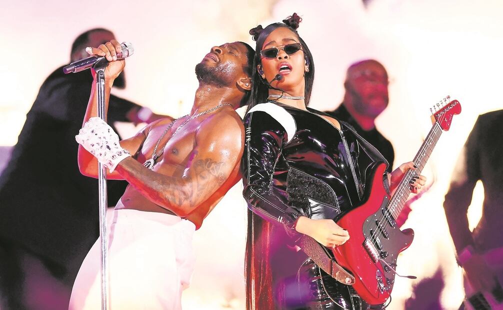 La intérprete y multiinstrumentista H.E.R.
participó con su guitarra y cantó “Bad girls”. Foto: AFP