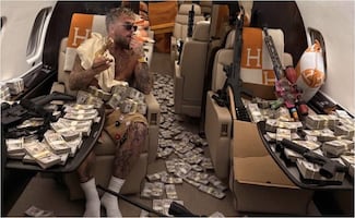 La polémica publicación de Jake Paul, rodeado de billetes y armas, tras ser noqueado por Anthony Joshua