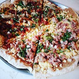 Prueba la pizza de suadero, carnitas o chicharrón 