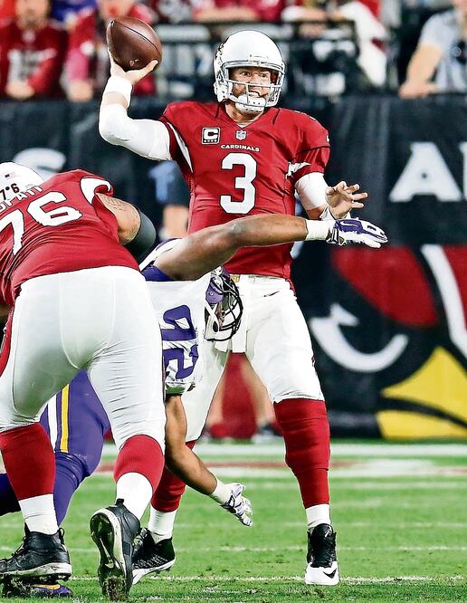 Carson Palmer lanzó para 310 yardas y dos touchdowns (RICK SCUTERI. AP)