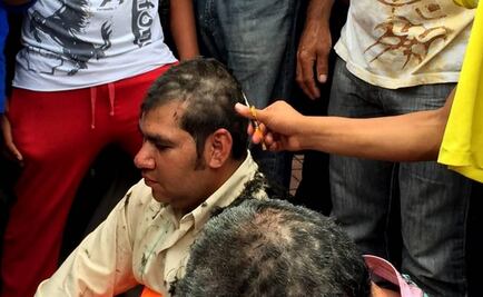 Mexican teachers have heads forcibly shaved for not striking